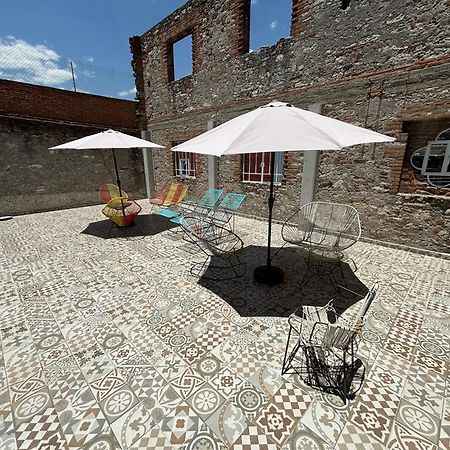 Hostal Casa De Arcos بويبلا المظهر الخارجي الصورة